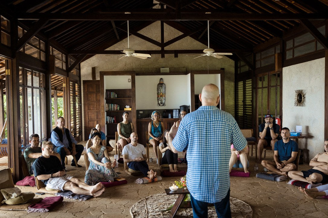 Matt Landau facilitating a circle in the open-air hall at Imiloa Institute, Costa Rica